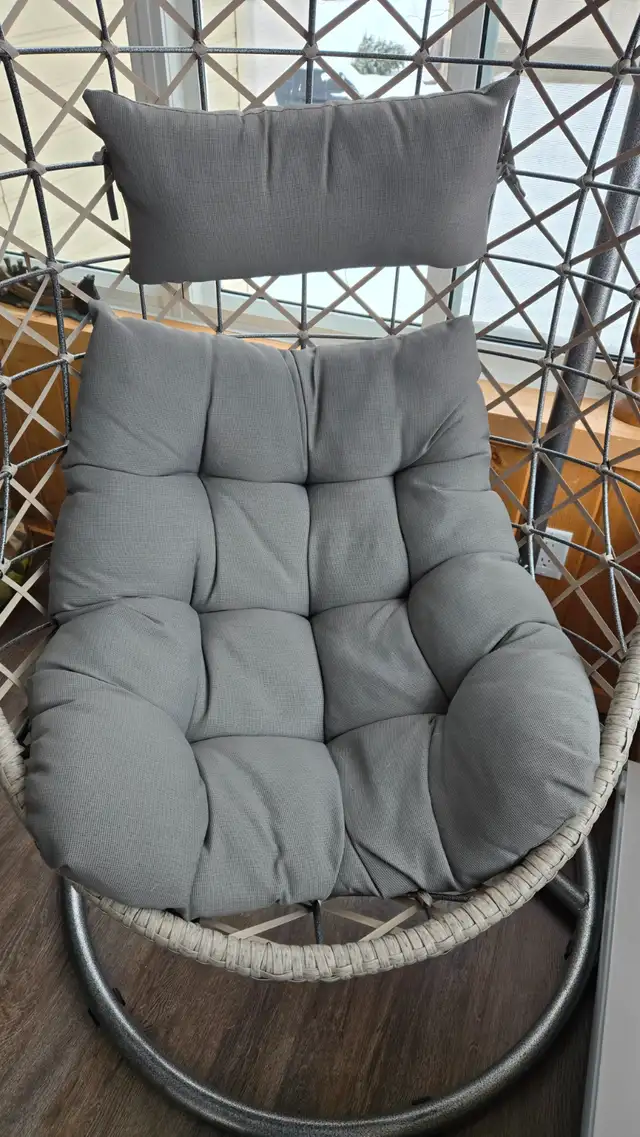 Patio swinging basket chair. Like new condition.