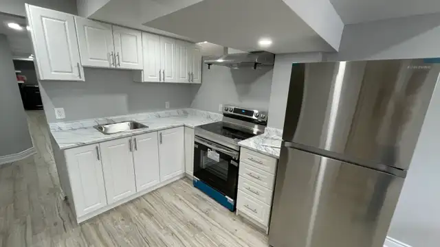 Spacious Basement with 2 bedrooms and 2 Parking spots