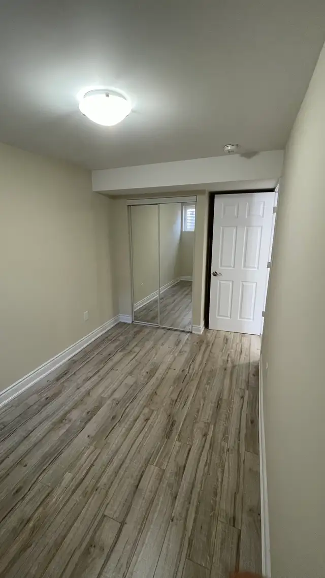 Spacious Basement with 2 bedrooms and 2 Parking spots - Photo 4