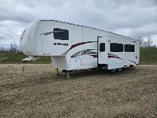 2009 Heartland 3300RC 33 Ft T/A Toy Hauler Fifth Wheel Sundance