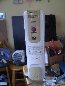 NOMA EW2307C OIL FILLED PORTABLE SPACE HEATER 1500 WATTS- $50