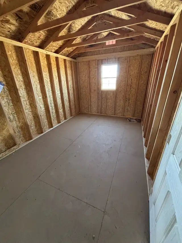 10x16 utility shed with overhead door - Photo 2