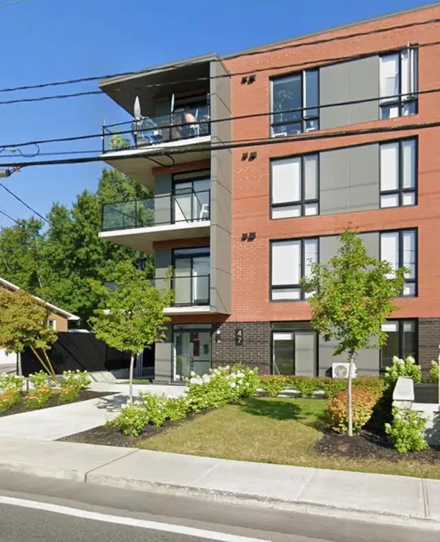 Très  Grand  Condo 5 1/2  à louer - Photo 2