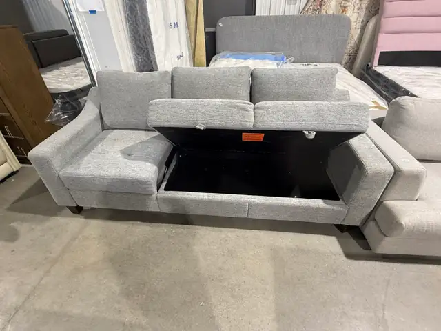 Grey fabric sofa with storage seats and fold out chaise - Photo 3