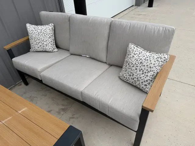 Outdoor patio sofa with 2 swivel chairs and table - Photo 3