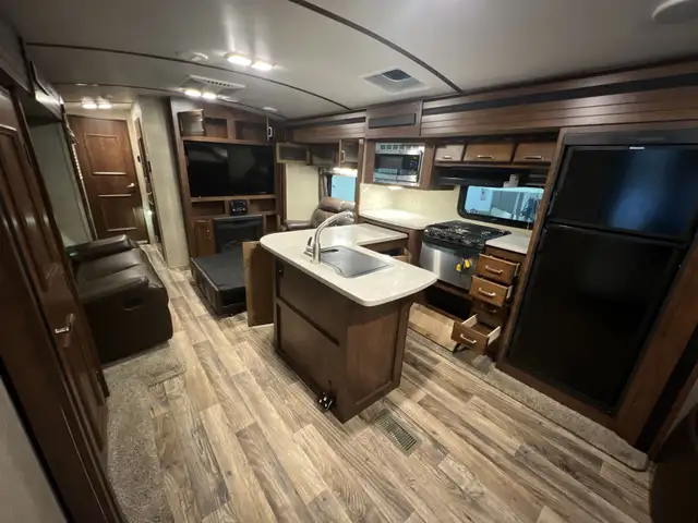 2017 Keystone Outback 332FK, FRONT KITCHEN & DINETTE SPACIOUS - Photo 5