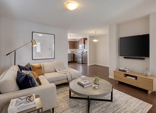 PRICE DROP! MODERN FULLY DEVELOPED COCHRANE HOME FOR SALE - Photo 2