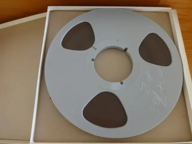 10" used studio grade plastic reels with ¼" tape for sale