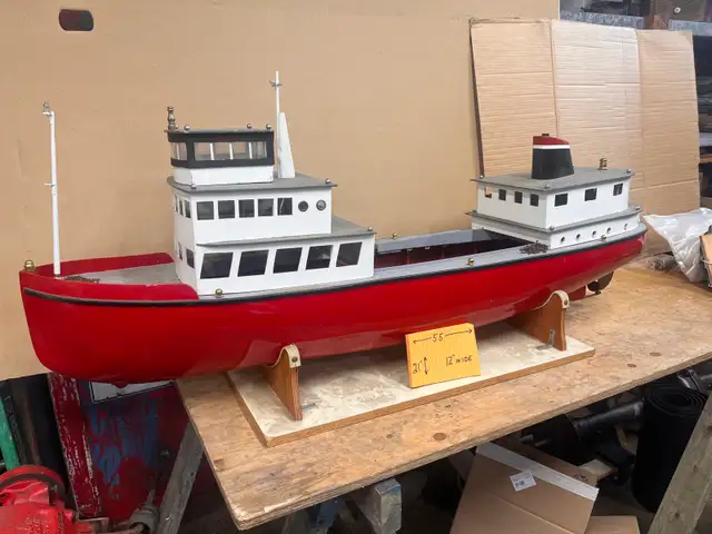 Huge remote controlled 1950s utility river tugboat