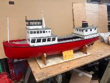 Huge remote controlled 1950s utility river tugboat