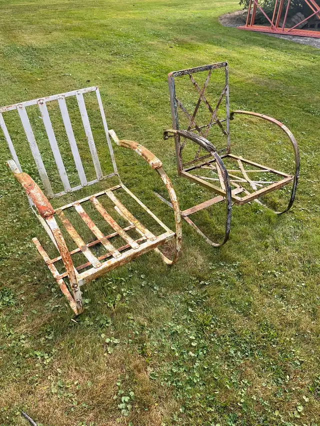 Two rare mid century Bunting spring chairs