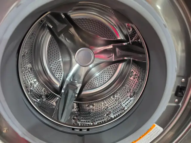 LG 27' Stainless Steel Front-Load Washer Dryer Set W/ Pedestals - Photo 4