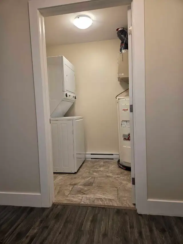 Modern 1 Bedroom – Easy Living | Ground Level | In-Suite Laundry - Photo 8