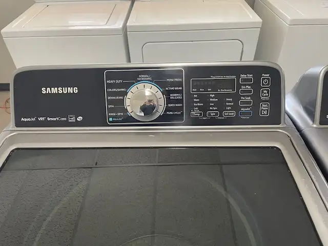 Laveuse sécheuse top load grises grande capacité Samsung - Photo 2