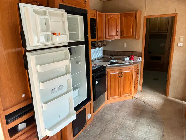 2008 Sandpipier fifth wheel camper (Bunk room) - Photo 7