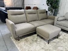 Brown fabric sofa with matching ottoman