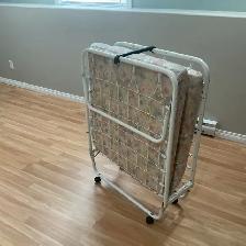 Folding metal twin bed with mattress