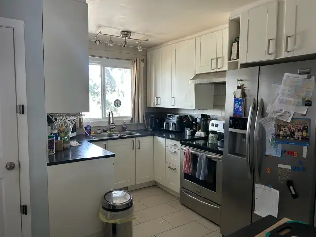 Beddington - Main Floor 3BR 1.5Bath - Photo 5