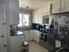 Beddington - Main Floor 3BR 1.5Bath - Photo 5