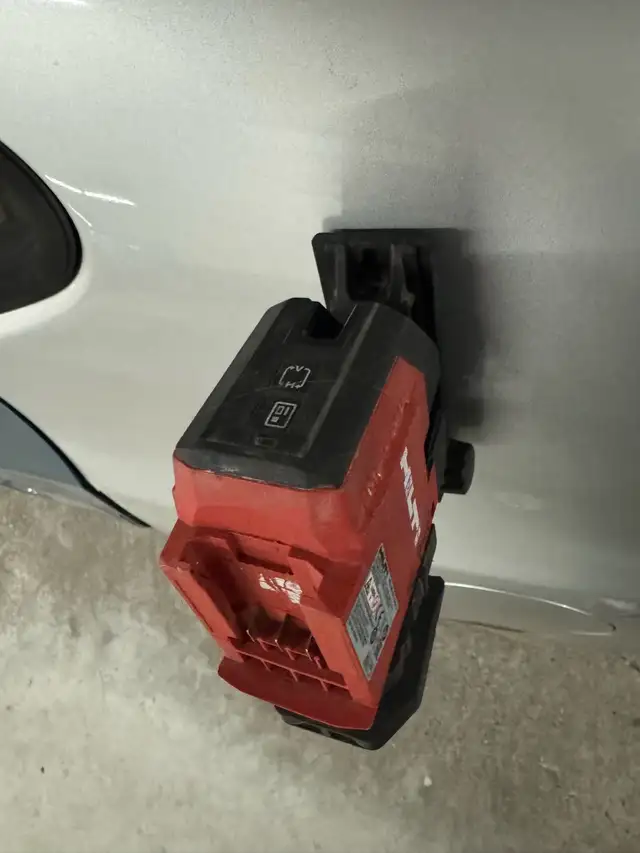 hilti laser and a box of foam