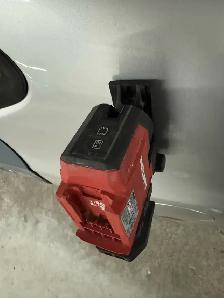 hilti laser and a box of foam