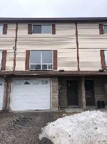 ELLIOT LAKE: 3 Bedroom Townhouse w garage, yard, basement