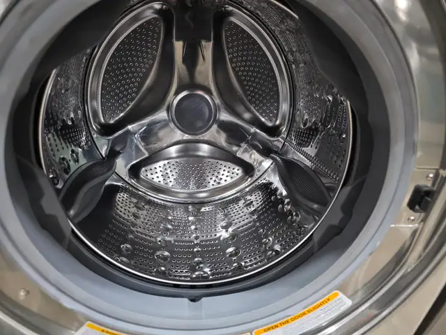 LG STEAM 27' Stainless Steel Front-Load Stackable Laundry Washer - Photo 3