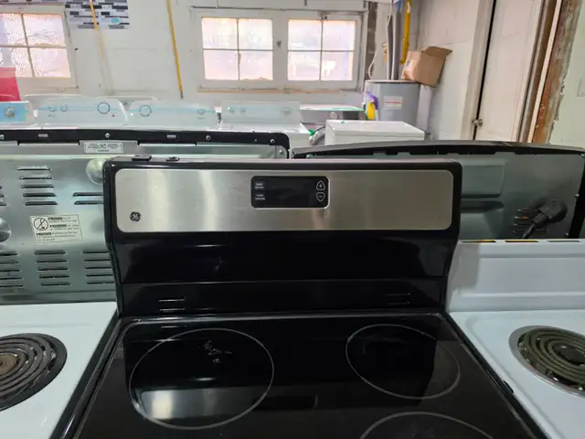 GE 24' Stainless Steel Freestanding Electric Ceramic Top Stove - Photo 2