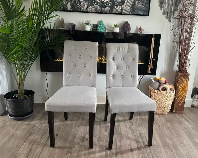 PAIR OF GREY DINING CHAIRS ($50 for the pair)