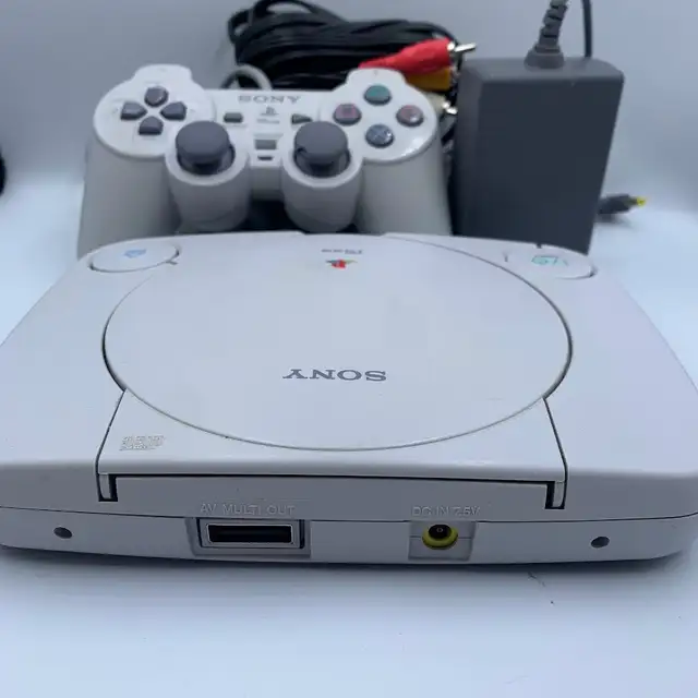 Psone console with controller, power, and video