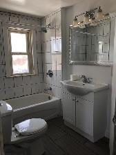 Renovated 2 bedroom in triplex, laundry, parking, deck & yard. - Photo 6