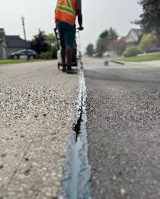 Line Painting • Crack Sealing • Cut & Patch Repairs • Parking Lo - Photo 10