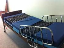 Roho mattress and electric hospital bed for $1000