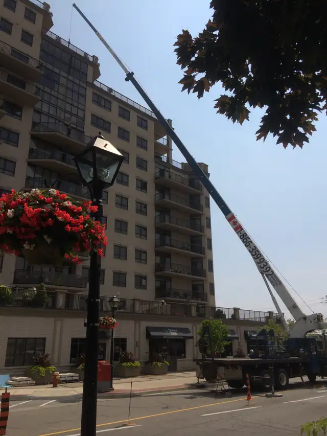 equipment moving, roof top moving,  from: cpcrane.com - Photo 8