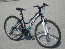 BIKE USED ONCE FEMALES 26' CCM HARDLINE 21 SPD WITH SUSPENSION!