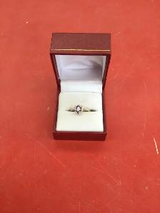 bague en or à pierre violette - Photo 2