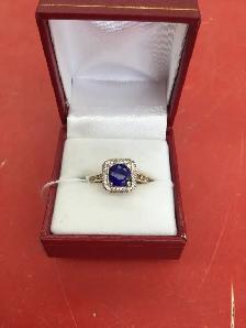 bague en or carré à pierre bleu
