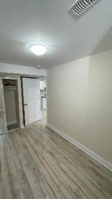 Basement with 2 bedrooms, 2 Parking spots near GO Station