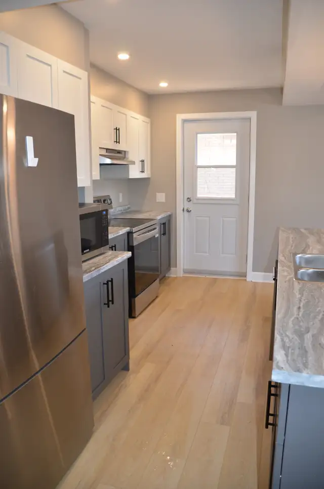 New 3BR — Truly All-Inclusive w/ Parking, Snow & Lawn Care - Photo 5