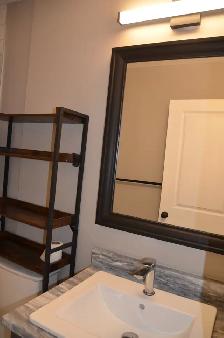 Renovated 3BR Lower Unit — Gas Fireplace, Kitchen Island, Truly - Photo 9