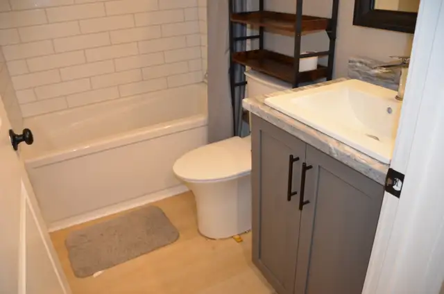 Renovated 3BR Lower Unit — Gas Fireplace, Kitchen Island, Truly - Photo 12
