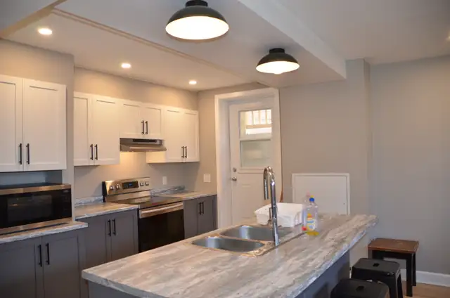 Renovated 3BR Lower Unit — Gas Fireplace, Kitchen Island, Truly - Photo 30