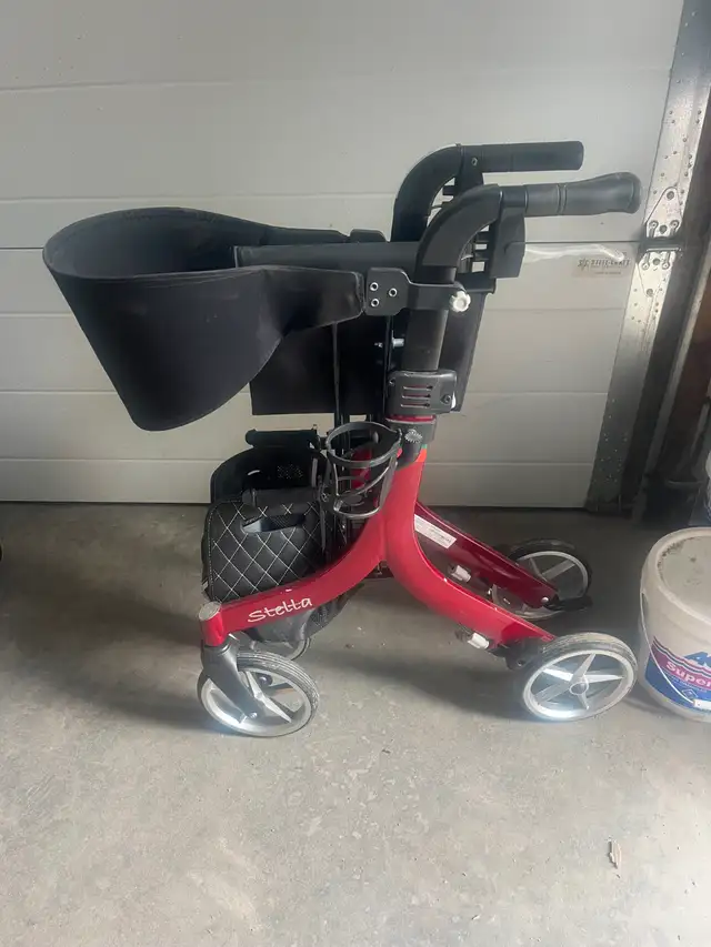 Stella mobility walker.  fold-up transport chair