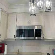 Over the range microwave installation