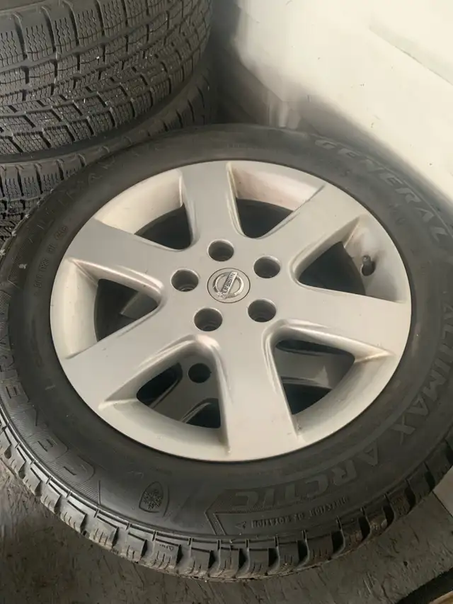16" Nissan alloys rims/ 215/55 R 16" winter tires - Photo 4