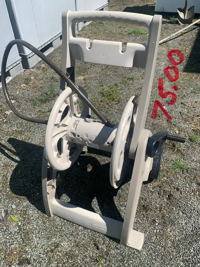 three garden hose reels/ price on pictures