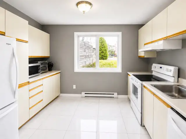 Grand 5 1/2 1er niveau Triplex Nord - Photo 4