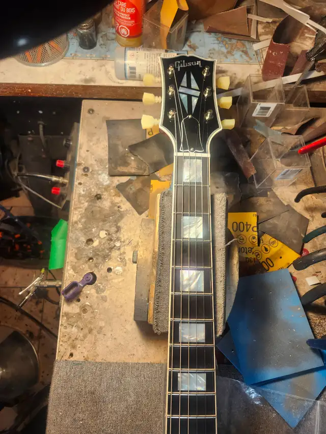 The Guitar Shoppe Calgary complete fret leveling - Photo 3