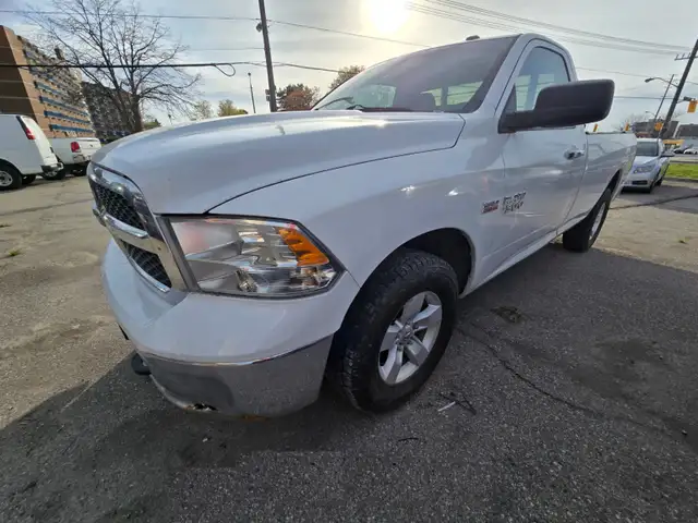2015 Ram 1500 4WD Reg Cab 140.5' SLT