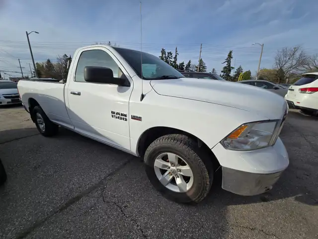 2015 Ram 1500 4WD Reg Cab 140.5' SLT - Photo 7